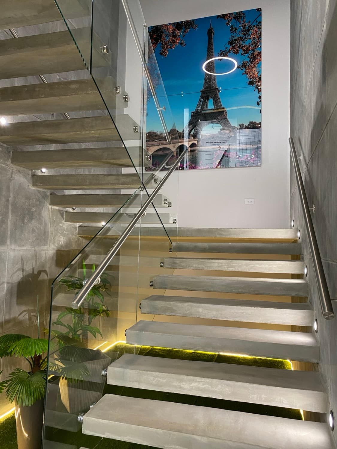 Modern glass staircase and lobby interior