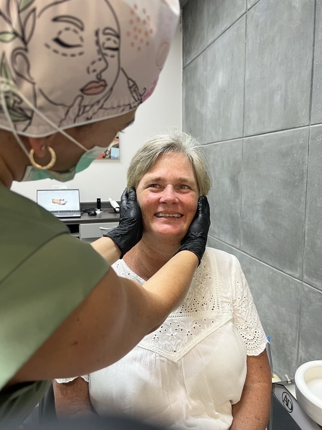 Patient smiling during consultation